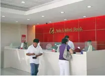  ?? BW FILE PHOTO ?? ASIA United Bank Corp.’s net income rose in the first semester.