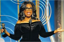  ?? THE ASSOCIATED PRESS ?? Oprah Winfrey accepts the Cecil B. DeMille Award at the 75th Annual Golden Globe Awards in Beverly Hills, Calif., on Sunday.