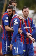  ??  ?? END OF ERA: Inverness’ Kevin McNaughton (centre) is consoled at the full-time whistle