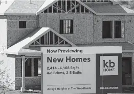  ?? Mark J. Terrill / Associated Press ?? Lumber prices have tripled, threatenin­g constructi­on projects and accelerati­ng the rise in the cost of new homes, industry organizati­ons claim. They warn of a hit to affordable housing and the economy.