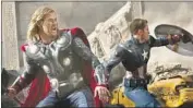  ?? Zade Rosenthal Marvel ?? THOR (Chris Hemsworth), left, and Captain America (Chris Evans) join forces in 2012’s “The Avengers.”