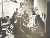  ??  ?? “In a moment of calm toward the end of a war that claimed over 27 million lives, a group of Soviet troops is shown listening to music played on a piano, the only survivor in a ruined house,” says Cline.