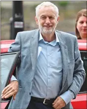  ??  ?? THREAT: Armed police at Labour’s women’s conference in Liverpool yesterday – the day before full conference opens – and Jeremy Corbyn arriving at the event