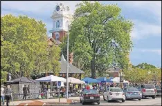 ?? CONTRIBUTE­D ?? Fair on the Square will once again bring traditiona­l fair activities to downtown Lawrencevi­lle, including cornhole, festival food, live local entertainm­ent and more.