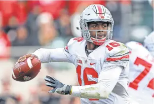  ?? MIKE CARTER, USA TODAY SPORTS ?? J.T. Barrett helped Ohio State win the 2014 national title and wants to add a second trophy.
