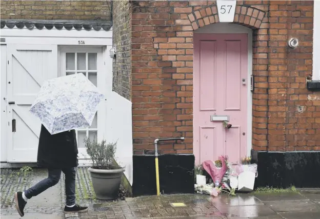  ?? PICTURE: DOMINIC LIPINSKI/PA ?? 0 Floral tributes placed outside the home of Caroline Flack, below, in north London after the TV presenter’s death