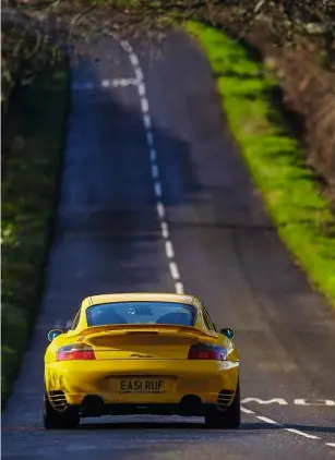  ??  ?? Above and right: the 996 is already slimmer than today’s 911s, but the Rturbo’s Carrera body option helps it feel even better suited to narrow British roads