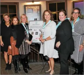  ??  ?? Carolyn Losty of Radnor, Liz Raynes of Bryn Mawr, Jen McAleese and Rhonda Mordy of Villanova, Michelle Constable of St. Davids and Liz McNulty, also of Bryn Mawr get ready for the event to begin.