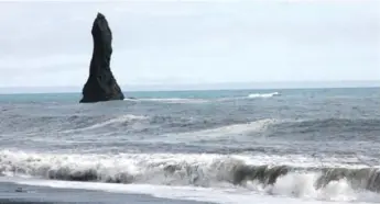  ?? ALEXANDRA KOPSTALS PHOTOS ?? Local legend says that the rocky oddities just offshore at Reynisfjar­a are mischievou­s trolls that turned to stone.