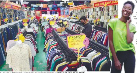  ?? COURTESY OF JAFRI ABDUL MANAF ?? A customer looking through clothes inside the bundle clothing store. –