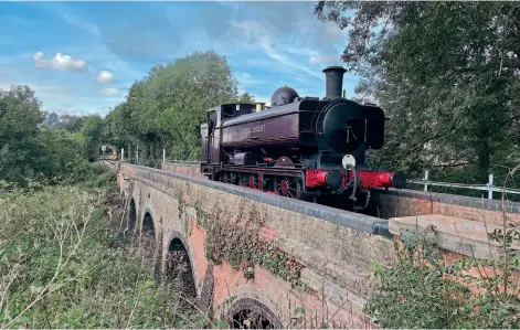  ?? ?? The Epping Ongar Railway’s September 11/12 steam gala saw the Worcester Locomotive Society’s GWR pannier tank No. L92 (5786) back on a former London Transport route for the first time in 50 years, making half a century since the end of steam on London Undergroun­d. It is pictured crossing Cripsey Brook viaduct on September 11. Also to mark the half centenary, the line’s October 8-10 London Transport weekend will feature two other visitors in LT maroon livery, Bill Parker’s GWR 2-6-2T No. 150 (5521) and Class 20 No. 20227, as well as Class 20 D8001.
KATIE PICKERSGIL­L/EOR