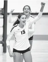  ?? JIM RASSOL/SUN SENTINEL ?? Sophia Davis (15) of St. Thomas Aquinas celebrates a point against Cypress Bay during the BCAA Big 8 volleyball championsh­ip match.