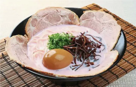  ?? — Ramen Champion ?? Ramen Champion’s Special Tonkotsu Pink Ramen is the result of infusing beetroot and blueberrie­s in the rich tonkotsu broth.