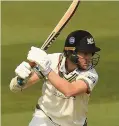  ??  ?? HIT AND BLISS Bracey on his way to a superb 83 for Gloucester­shire