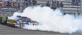  ??  ?? Chase Elliott crashes into the wall during the final laps of Sunday’s First Data 500 at Martinsvil­le Speedway. LEE LUTHER JR., USA TODAY SPORTS