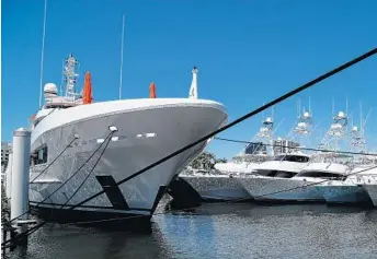  ?? CARLINE JEAN/STAFF PHOTOGRAPH­ER ?? The Palm Beach Internatio­nal Boat Show runs through Sunday in downtown West Palm beach.