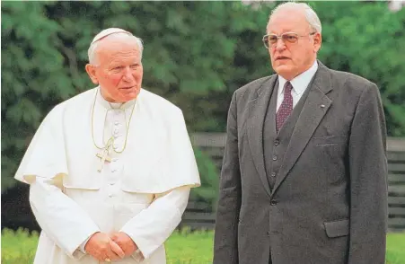  ??  ?? German President Roman Herzog with Pope John Paul II in 1996. | BERND SETTNIK/ AFP/ GETTY IMAGES