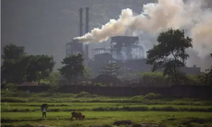  ?? Photograph: Altaf Qadri/AP ?? A coal-powered steel plant in the the state of Jharkand, east India. The country became an associatio­n member of the IEA in 2017.