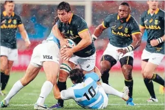  ?? Photos: GETTY IMAGES ?? South Africa 13 (Ruan Pienaar try; Handre Pollard penalty, conversion, Morne Steyn penalty), Argentina 6 (Nicolas Sanchez 2 penalties). HT: 10-3. Double trouble: South Africa’s Damian de Allende is stopped in his tracks by two Argentina players during...