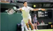  ?? PTI ?? Serbia's Novak Djokovic returns the ball to Serbia's Miomir Kecmanovic in a men's singles match on day five of the Wimbledon tennis championsh­ips in London, Friday