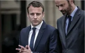  ??  ?? Le président a délégué au Premier ministre, Edouard Philippe (à dr.), le soin de s’exprimer sur l’affaire.