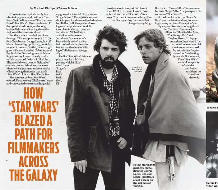  ??  ?? Lucasfilm/ Associated Press file In this March 1976 publicity photo, director George Lucas, left, and Mark Hamill talk about a scene on the salt flats of Tunisia.