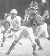  ?? JENNIFER LETT/SUN SENTINEL ?? Atlantic’s Kalani Ilimaleota prepares to pass during Friday night's game against Western in Delray Beach.