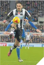  ??  ?? ■
Newcastle’s Aleksandar Mitrovic controls a high ball.