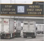  ?? DAN JANISSE ?? A Province of Ontario sign above the Herb Gray Parkway is urging people to stay home to help stop the spread of COVID-19.