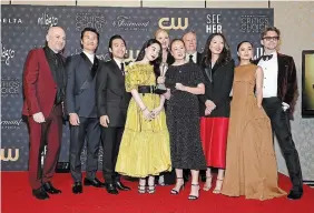  ?? EMMA MCINTYRE GETTY IMAGES FOR CRITICS CHOICE ?? From left, Michael Ellenberg, Soji Arai, Jin Ha, Min-ha Kim, Lindsey Springer, president, Scripted TV, Media Res Studio, Soo Hugh, Theresa Kang, CEO, Blue Marble Pictures, Anna Sawai and Jimmi Simpson, winners of the Best Foreign Language Series for “Pachinko,” during the 28th Annual Critics Choice Awards in January.