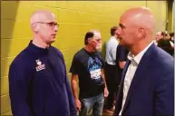  ?? David Borges / Hearst Connecticu­t Media ?? UConn men's basketball coach Dan Hurley, left, talks to baseball coach Jim Penders at the Coaches Road Show stop in Southingto­n Monday night.