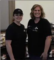 ?? Staff photo/Skyler Mitchell ?? Susan Krieg (left) and Abby Balster (right) have recently joined forces, with Tin Acre Gourmet Popcorn now selling some of its product at The Pie Shell on South Washington Street.