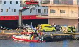  ?? Picture: PA. ?? Emergency personnel at Bergen Harbour.