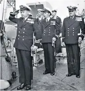 ??  ?? Downes, in foreground, commission­ing HMAS Kookaburra
