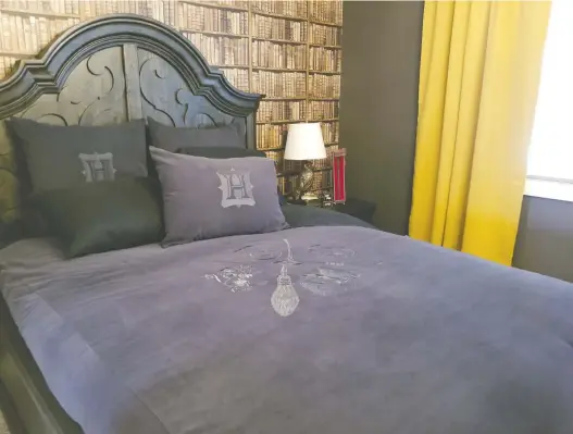  ?? PHOTOS: LAURA SEVERS ?? One of the bedrooms in the 2019 Cash & Cars lottery home by Kimberley Homes has been created with a Harry Potter theme — complete with Hogwarts linens.