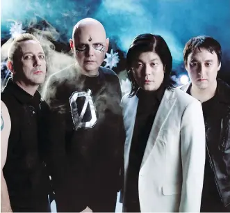  ?? SONY MUSIC ?? Jeff Schroeder, left, Billy Corgan, James Iha and Jimmy Chamberlin form the reconstitu­ted Smashing Pumpkins — a band that is built to last this time around, according to Corgan.