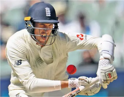  ??  ?? Pain game: England’s Craig Overton is hit by the Pat Cummins bouncer that left him with a fractured rib