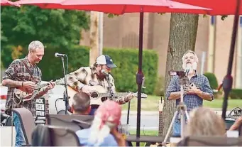  ?? Contribute­d photo ?? Best Video and Coffee Shop added a new outdoor deck in 2020. The deck helps facilitate Best Video's presentati­on of live music.