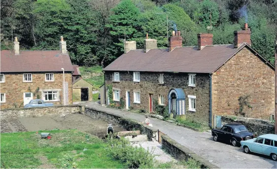  ?? Pictures: Port Talbot Historical Society ?? > Homes in Groes were bulldozed after a battle to save the village failed