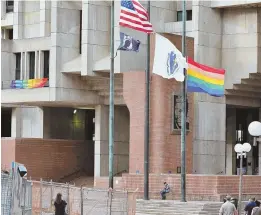  ?? staff file photo by chris christo ?? PUBLIC PLAZA: City Hall won’t allow an evangelica­l group to have its banner join a range of others that have flown there.