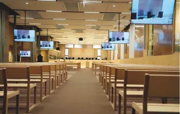  ?? AP ?? ■ The specially built courtroom in the 13th century Palais de Justice courthouse in central Paris. The trial of 20 suspects in the November 13, 2015, Paris attacks, which killed 130 people, is expected to last nine months, with nearly 1,800 plaintiffs and more than 300 lawyers involved.