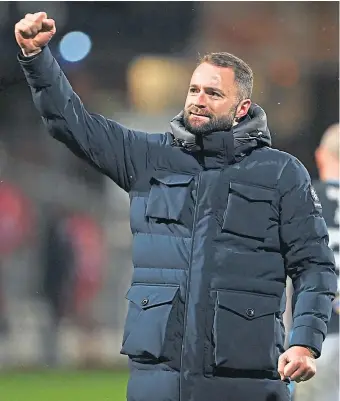  ?? ?? Dundee boss James McPake salutes Dee fans after the win over St Johnstone.