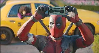  ?? Associated Press photos ?? This image released by Twentieth Century Fox shows Ryan Reynolds in a scene from “Deadpool 2.”