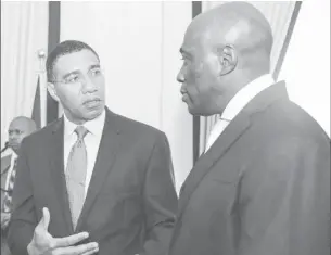  ??  ?? Prime Minister Andrew Holness with acting chief justice Bryan Sykes
