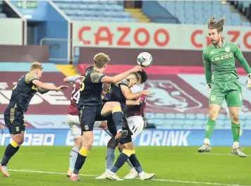  ??  ?? DESPERATE MEASURES: Villa keeper Jed Steer joins the attack in the closing stages.