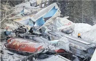  ??  ?? The Transporta­tion Safety Board continues to investigat­e a derailment near Field in February 2019.