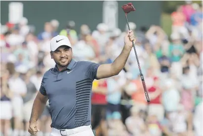  ?? Picture: Getty Images ?? HUGE RELIEF. Jason Day of Australia celebrates on the 18th green after winning the Wells Fargo Championsh­ip by two shots at Quail Hollow on Sunday.