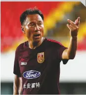  ??  ?? Veteran...Shen Xiangfu is in charge of the training camp