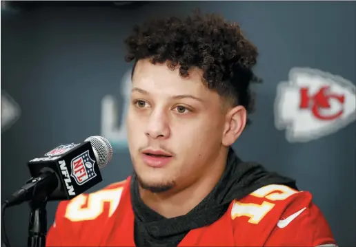  ??  ?? Chiefs quarterbac­k Patrick Mahomes (15) speaks during a news conference on Thursday in Aventura, Fla., for the NFL Super Bowl 54.