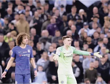  ?? | AP ?? KEPA ARRIZABALA­GA, right, and David Luiz react during the League Cup final soccer match between Chelsea and Manchester City at Wembley.